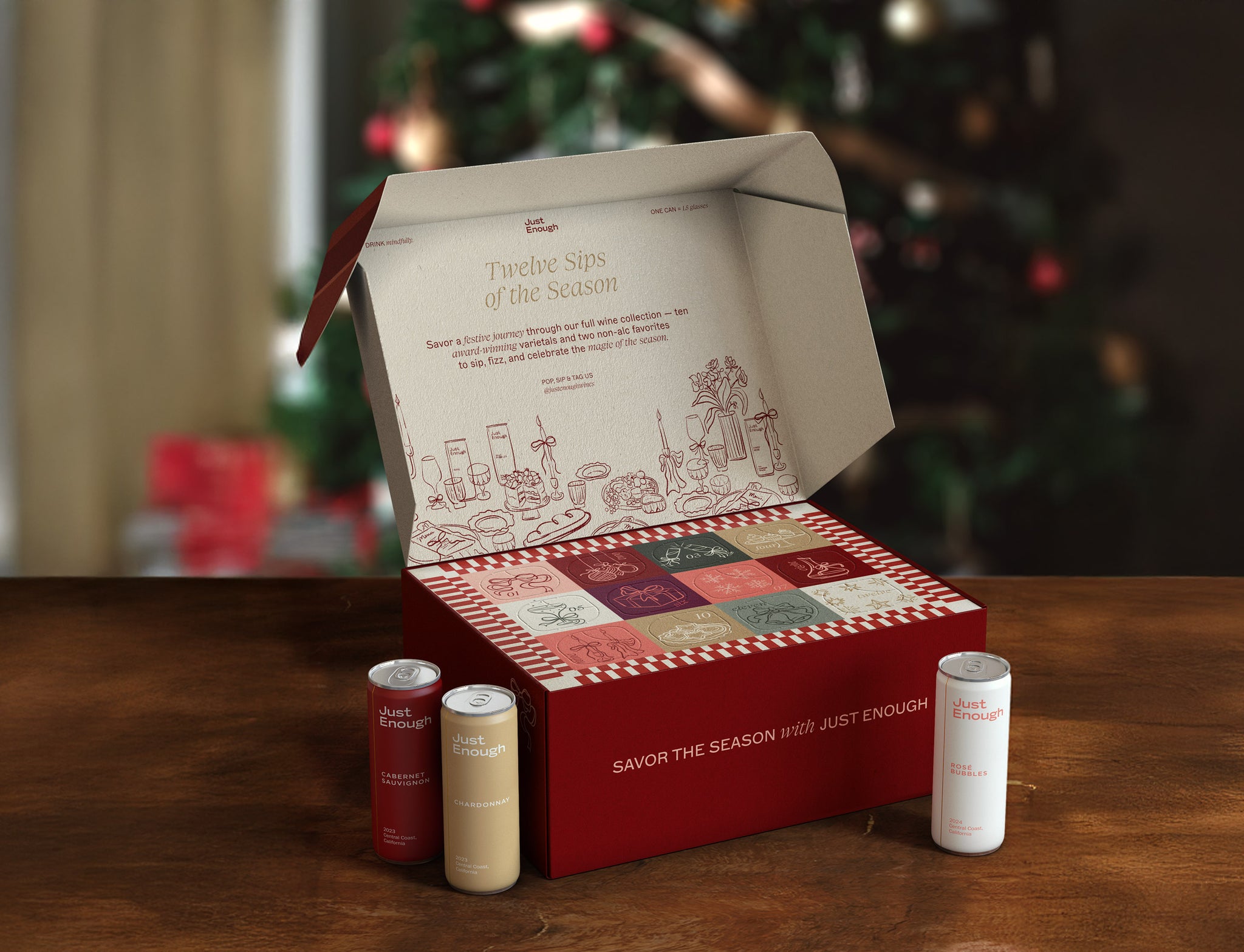 Holiday wine advent calendar in front of a christmas tree