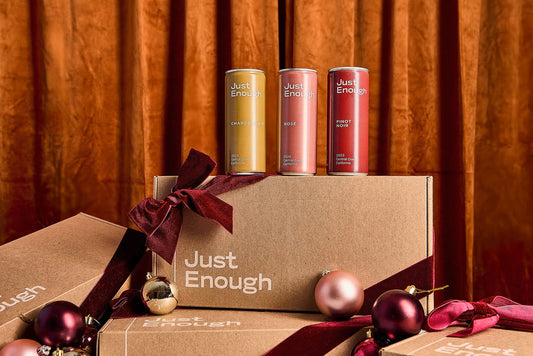 Just Enough Wines holiday gift set featuring single-serve cans of Chardonnay, Rosé, and Pinot Noir.
