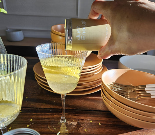 The Just Enough Chardonnay, one of the most popular Dry wine choices, is being poured into a glass.