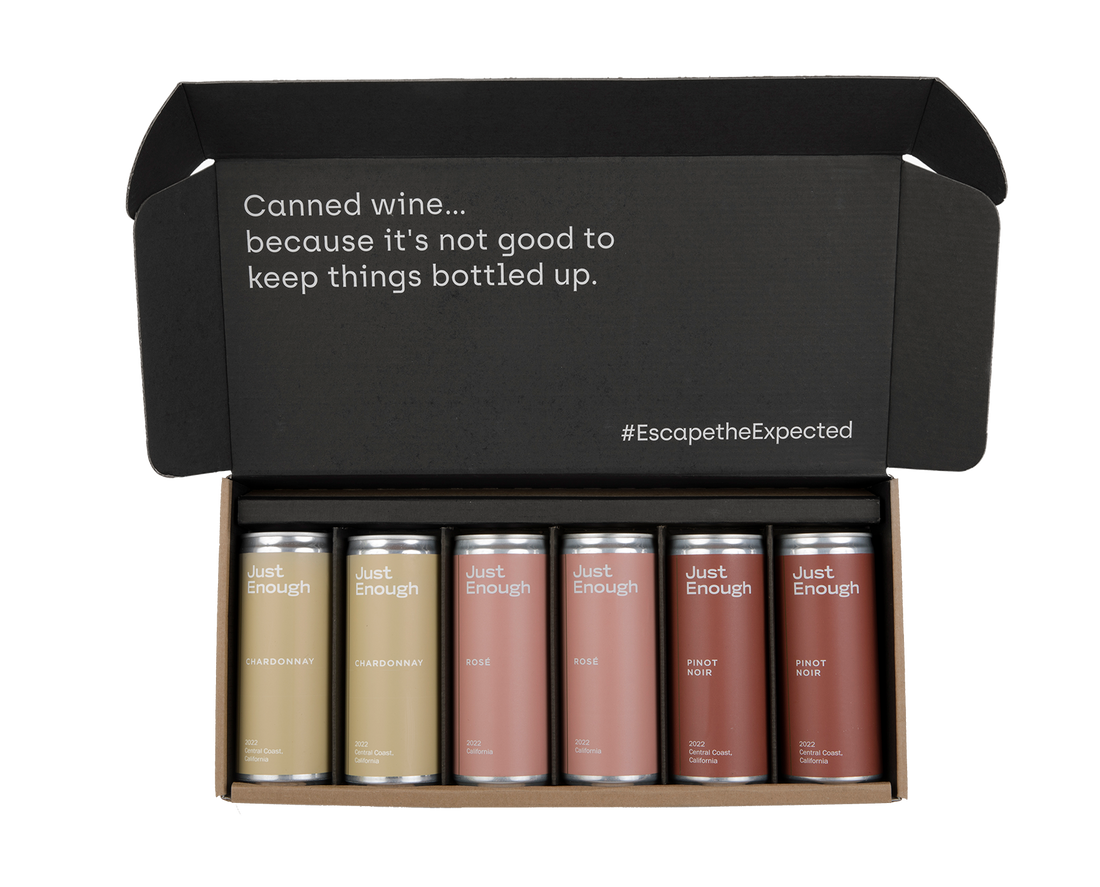 Six-pack of Just Enough Wines featuring Chardonnay, Rosé, and Pinot Noir cans.